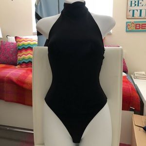 Black halter body suit